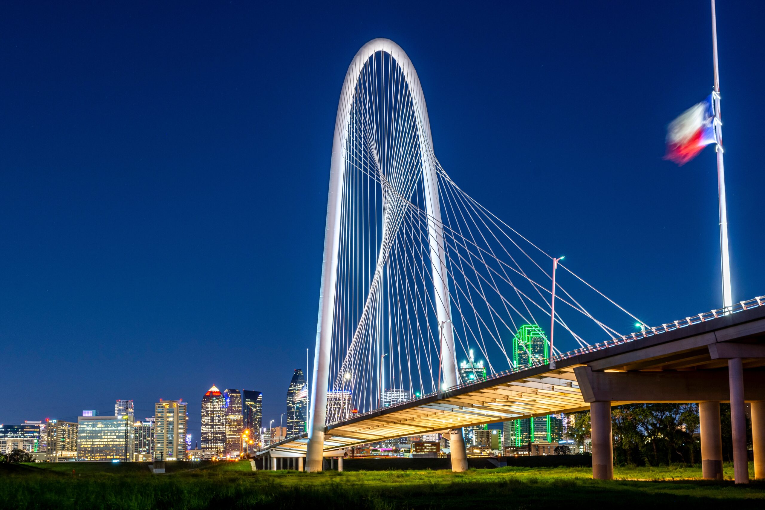 Margaret Hunt Hill Bridge in Dallas, with Dr. Green Services as the best local lawn care company providing green and weed-free lawns since 1986.