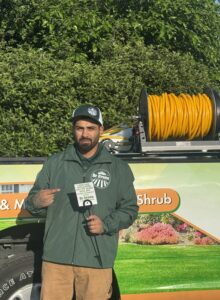 Dr. Green Services technician applying lawn treatment to prevent red thread fungus. 