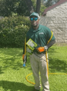 Dr. Green Services technician treating trees and shrubs for diseases