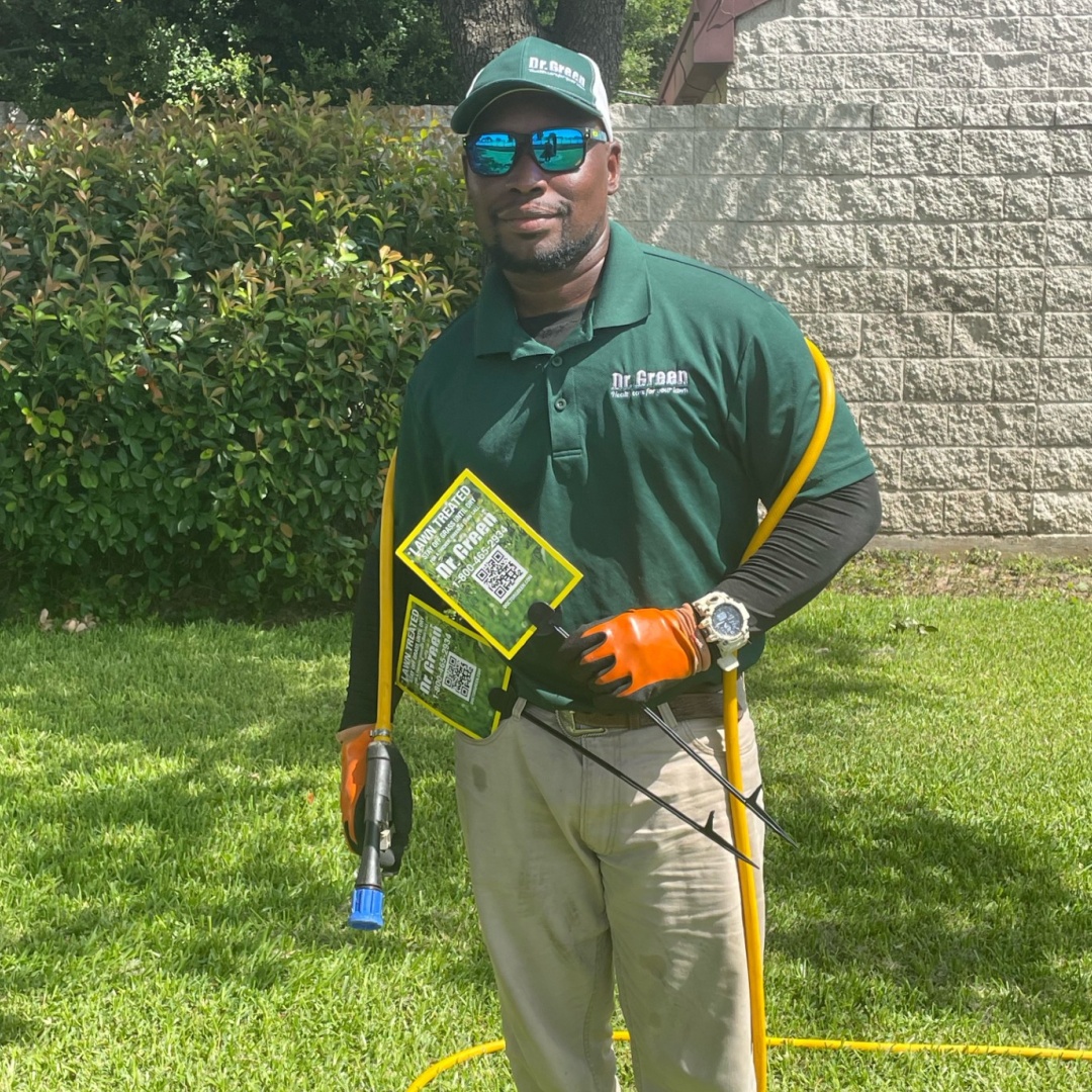 Dr. Green Services technician applying professional lawn care in Fort Worth TX