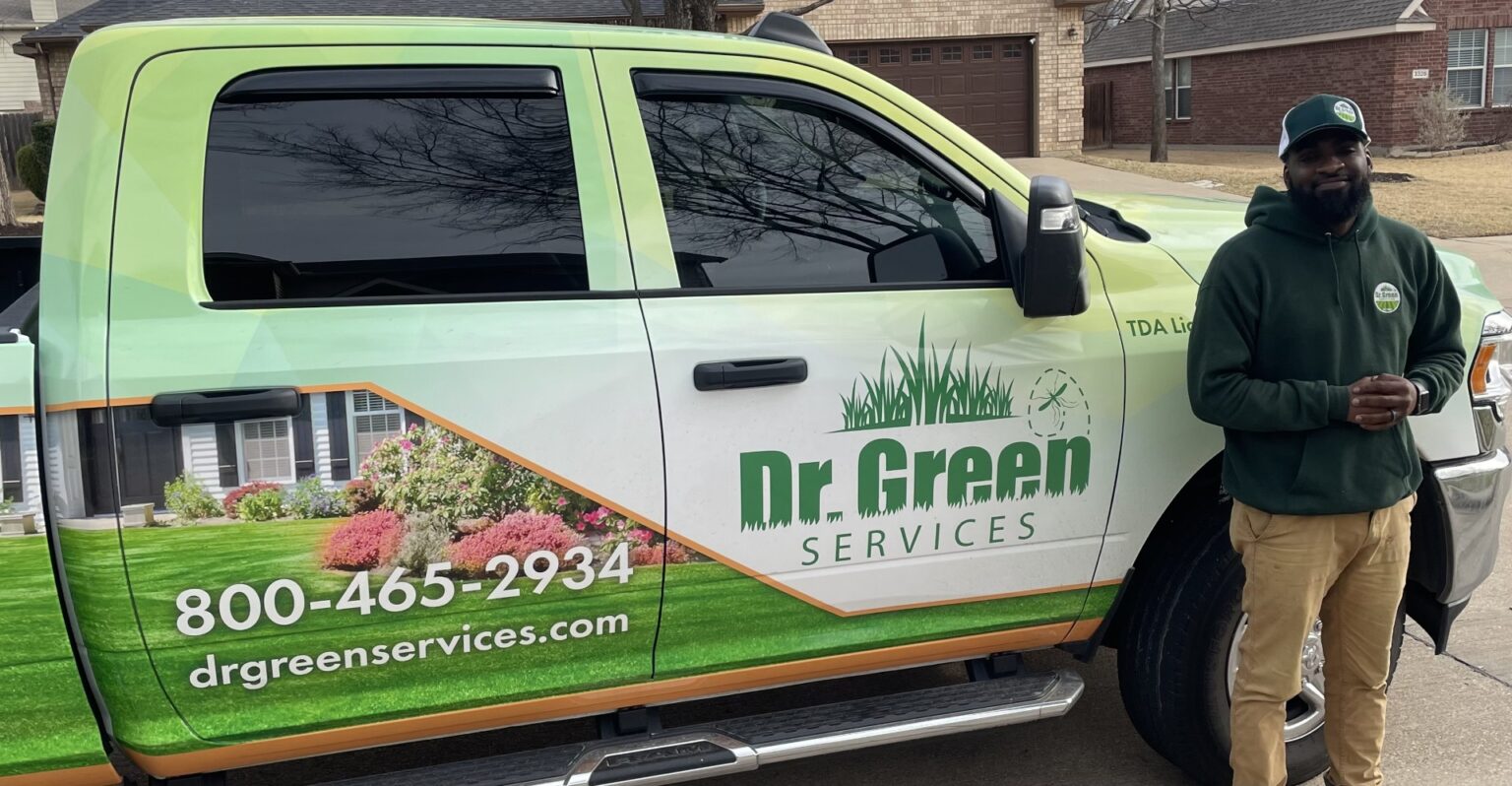 Dr. Green Services technician applying professional lawn care in Murphy TX