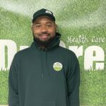 Andre, one of Dr. Green Services’ certified lawn care technicians, providing professional lawn treatments across Texas.