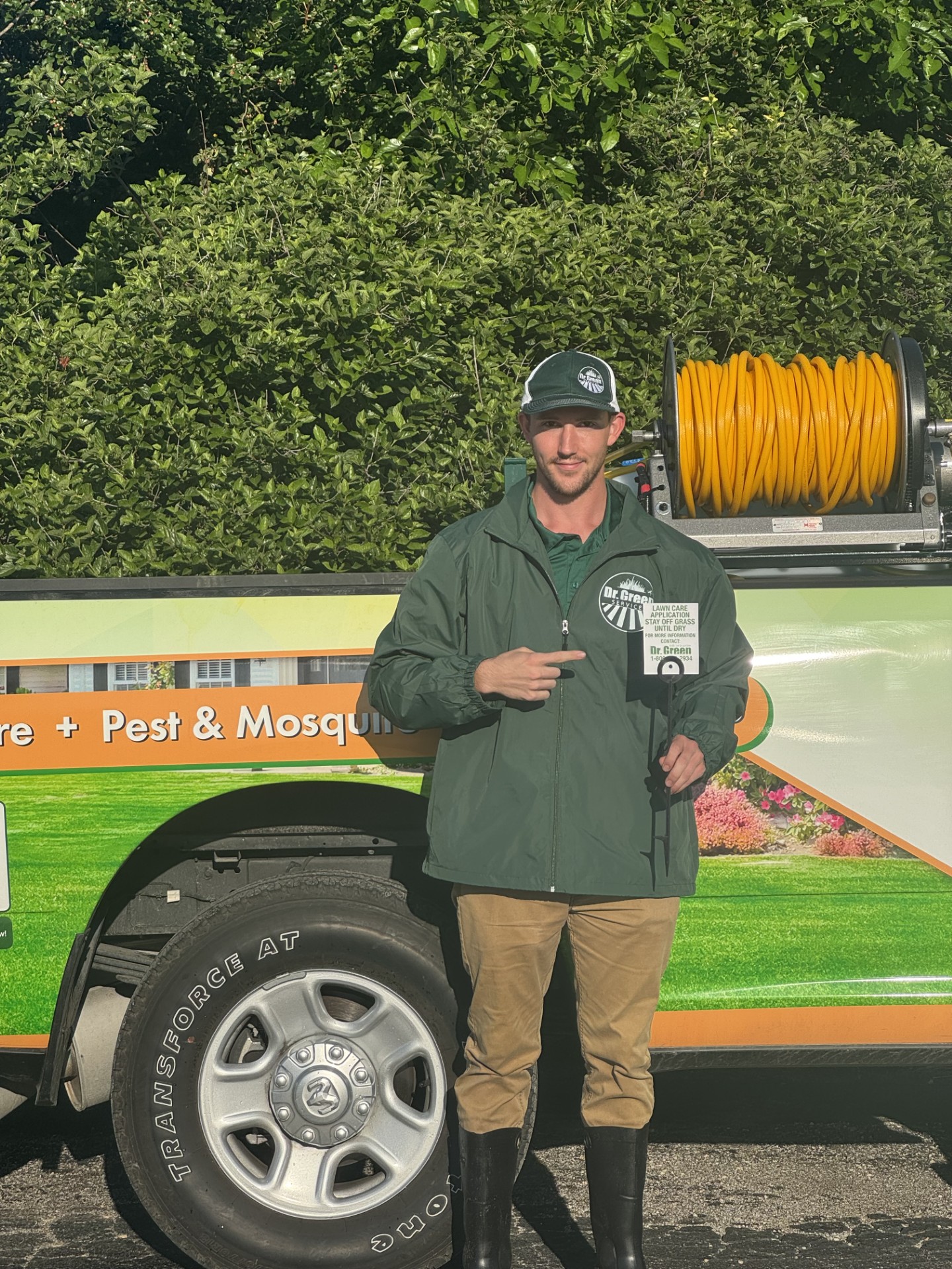 Dr. Green Services lawn care technician treating a yard in Forney, Texas