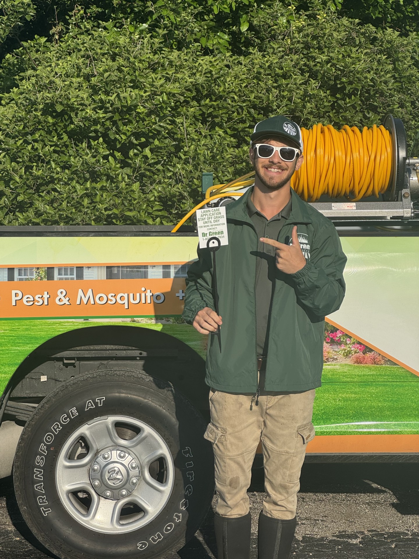 Dr. Green Services technician providing professional lawn care in Wheaton