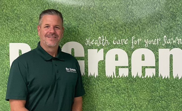 Ryan Van Haastrecht, President of Dr. Green Services, leading with lawn care expertise.