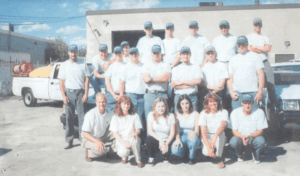 Original 1985 Dr. Green Services team photo showing the early roots of a family owned lawn care company.